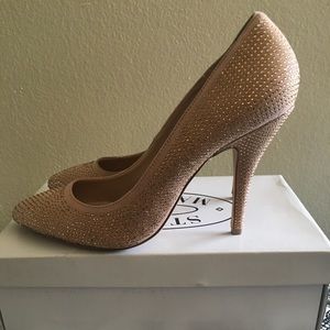 Steve Madden Beige/Nude pumps with Rhinestones.